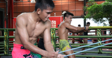 How to Turn Boxing Bag Workouts Into Full-Body Training