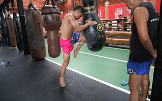 How to Transition from Heavy Bag Work to Sparring in Muay Thai