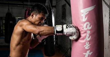 Unleash Your Inner Fighter: A Beginner’s Guide to Heavy Bag Training (No Coach Needed!)
